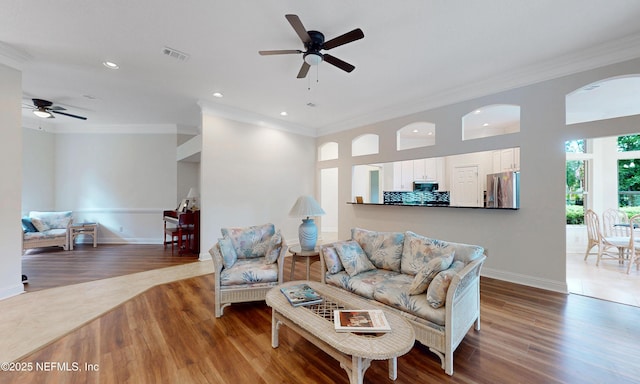 1877 Medinah Ln, Green Cove Springs, FL 32043 - living area featuring ceiling fan, ornamental molding, wood finished floors, and recessed lighting