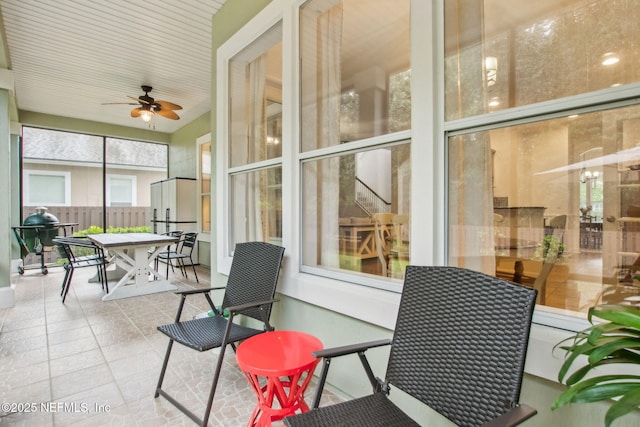 85488 Sagaponack Dr, Fernandina Beach, FL 32034 - sunroom / solarium with a ceiling fan, tile patterned flooring, and outdoor dining space