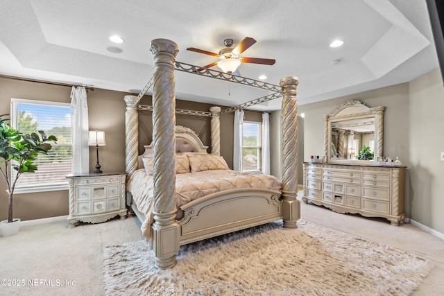 4749 Creek Bluff Ln, Middleburg, FL 32068 - bedroom featuring carpet floors, a textured ceiling, a ceiling fan, recessed lighting, and a raised ceiling