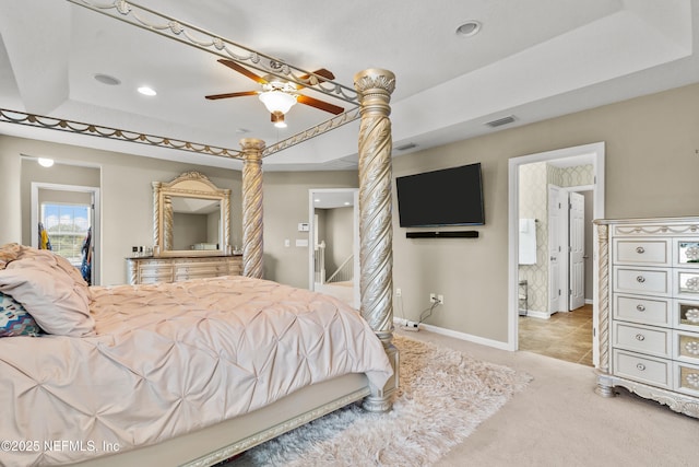 4749 Creek Bluff Ln, Middleburg, FL 32068 - bedroom featuring a raised ceiling, light carpet, recessed lighting, a ceiling fan, and connected bathroom