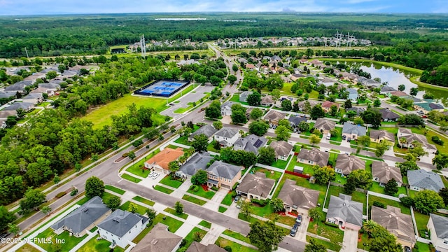 4749 Creek Bluff Ln, Middleburg, FL 32068 - aerial view of residential area featuring a heavily wooded area and a nearby body of water