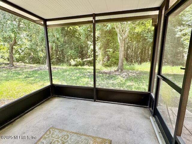 1810 Green Springs Cir Unit B, Fleming Island, FL 32003 - unfurnished sunroom featuring healthy amount of natural light