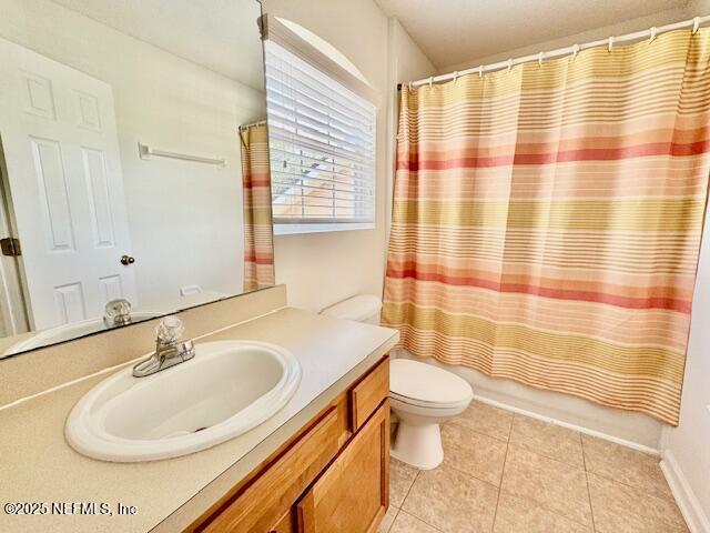 1810 Green Springs Cir Unit B, Fleming Island, FL 32003 - full bathroom featuring vanity and tile patterned floors