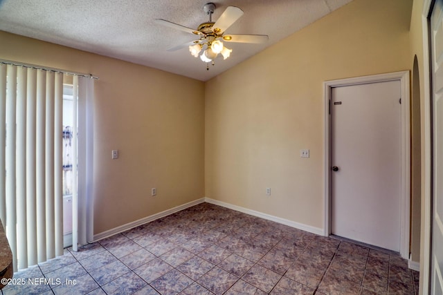 3371 Net Ct, Jacksonville, FL 32277 - unfurnished room with ceiling fan, a textured ceiling, and light tile patterned flooring