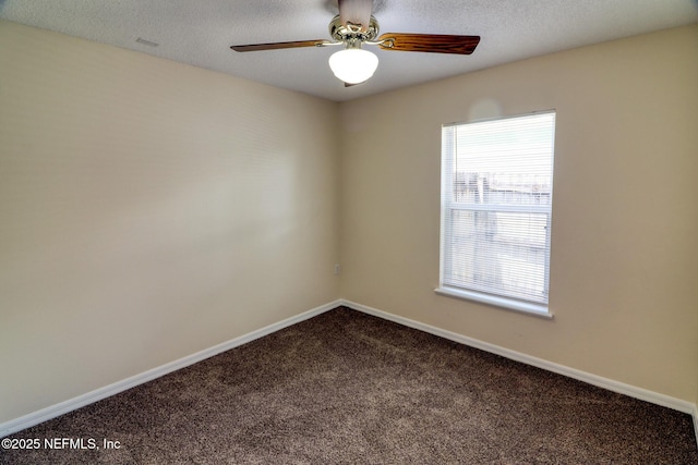 3371 Net Ct, Jacksonville, FL 32277 - unfurnished room with carpet, a ceiling fan, and a textured ceiling