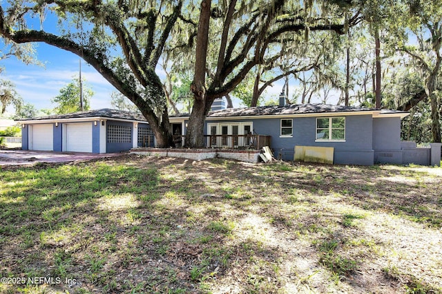 10268 Lake View Rd W, Jacksonville, FL 32225 - single story home featuring a wooden deck, crawl space, and an attached garage