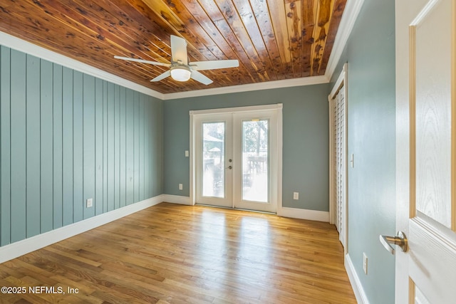 10268 Lake View Rd W, Jacksonville, FL 32225 - spare room featuring ornamental molding, wood ceiling, french doors, a ceiling fan, and light wood-type flooring