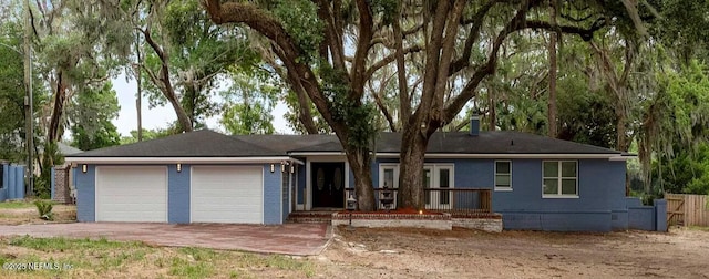 10268 Lake View Rd W, Jacksonville, FL 32225 - single story home with a garage, dirt driveway, and crawl space