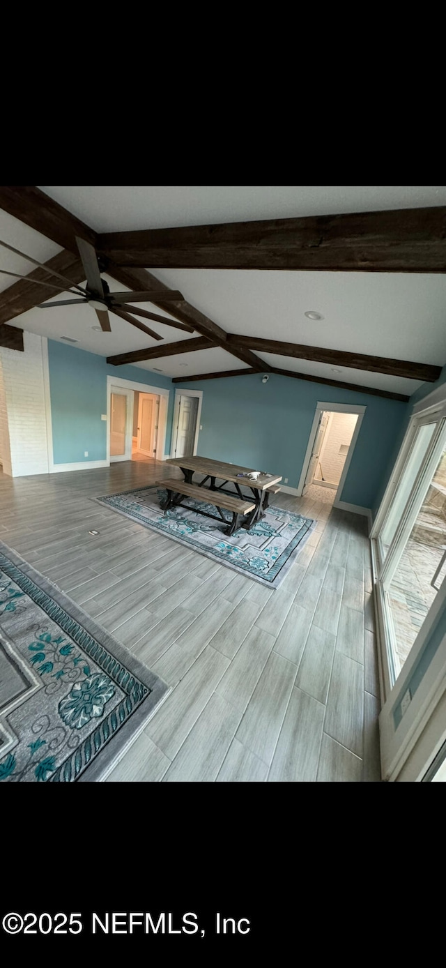 10268 Lake View Rd W, Jacksonville, FL 32225 - unfurnished bedroom with wood finished floors and beamed ceiling