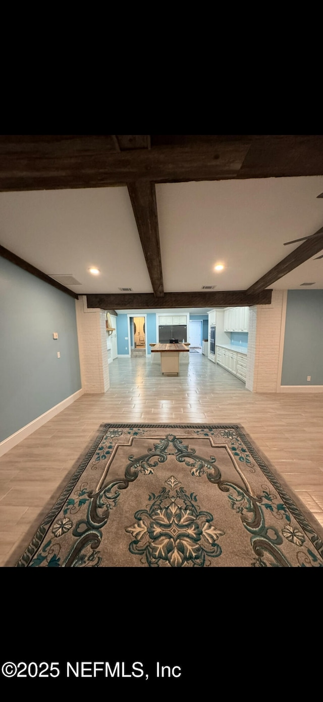 10268 Lake View Rd W, Jacksonville, FL 32225 - hall featuring wood finished floors and beamed ceiling