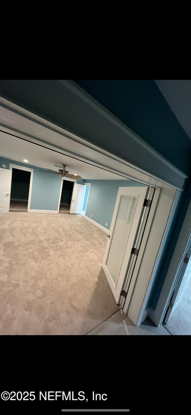 10268 Lake View Rd W, Jacksonville, FL 32225 - corridor featuring carpet and baseboards