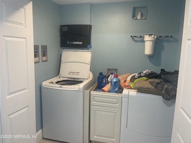 10268 Lake View Rd W, Jacksonville, FL 32225 - laundry area with washer / dryer and cabinet space