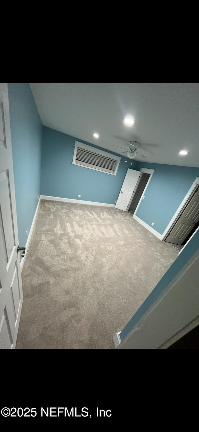 10268 Lake View Rd W, Jacksonville, FL 32225 - spare room with carpet floors, a ceiling fan, and recessed lighting