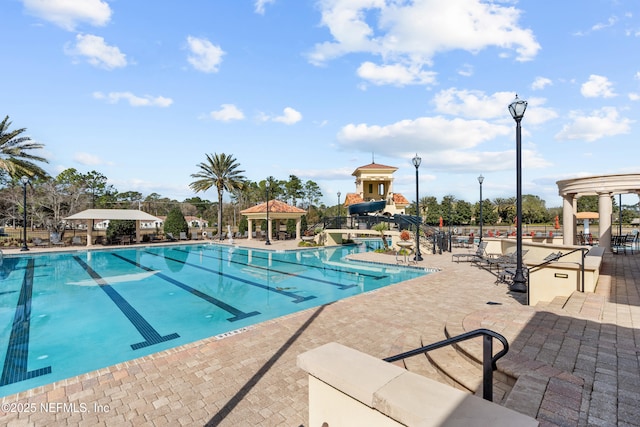 321 Palazzo Cir, Saint Augustine, FL 32092 - community pool with a gazebo, a patio, and a water slide
