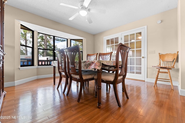 6032 Bob Kirkland Rd, Macclenny, FL 32063 - dining space featuring light wood-style floors, a textured ceiling, and a ceiling fan