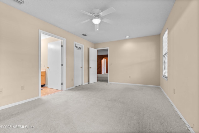 6032 Bob Kirkland Rd, Macclenny, FL 32063 - unfurnished bedroom with light colored carpet, ensuite bath, a ceiling fan, and recessed lighting