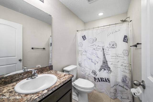 3299 Hidden Meadows Ct, Green Cove Springs, FL 32043 - bathroom with vanity, tile patterned flooring, a shower with shower curtain, and a textured ceiling