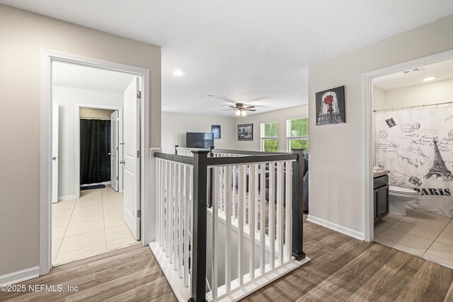 3299 Hidden Meadows Ct, Green Cove Springs, FL 32043 - hallway featuring an upstairs landing, wood finished floors, and recessed lighting