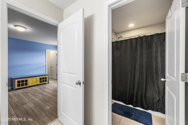 3299 Hidden Meadows Ct, Green Cove Springs, FL 32043 - full bath with a shower with curtain and wood finished floors