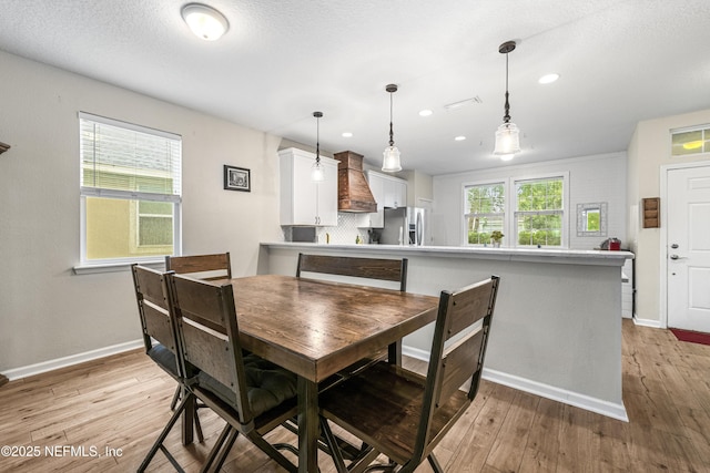 3299 Hidden Meadows Ct, Green Cove Springs, FL 32043 - dining area featuring light wood-style floors and recessed lighting