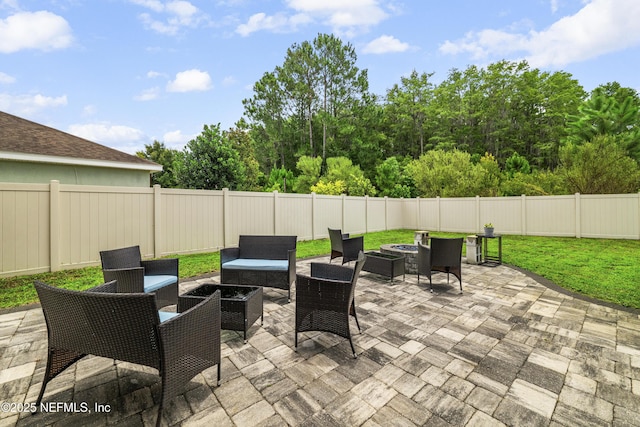 3299 Hidden Meadows Ct, Green Cove Springs, FL 32043 - fenced backyard featuring a patio area and an outdoor living space with a fire pit