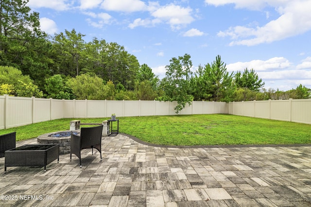 3299 Hidden Meadows Ct, Green Cove Springs, FL 32043 - fenced backyard with an outdoor fire pit and a patio area