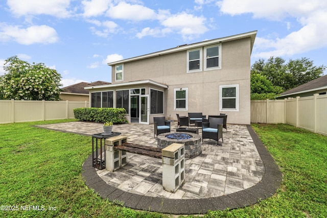 3299 Hidden Meadows Ct, Green Cove Springs, FL 32043 - back of property featuring a sunroom, stucco siding, a patio, and a fenced backyard