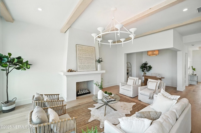 1509 Ocean Front, Neptune Beach, FL 32266 - living room featuring a chandelier, beamed ceiling, wood finished floors, and recessed lighting