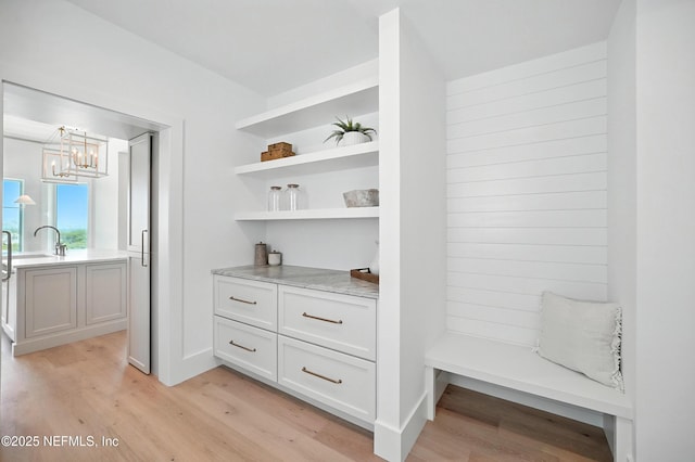 1509 Ocean Front, Neptune Beach, FL 32266 - detailed view of wood finished floors and a chandelier
