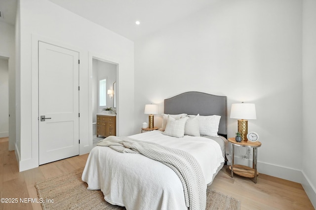 1509 Ocean Front, Neptune Beach, FL 32266 - bedroom featuring light wood-style floors, recessed lighting, and ensuite bathroom