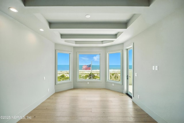 1509 Ocean Front, Neptune Beach, FL 32266 - spare room with wood-type flooring, recessed lighting, and a water view