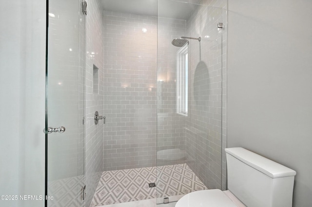 1509 Ocean Front, Neptune Beach, FL 32266 - bathroom featuring toilet and a shower stall