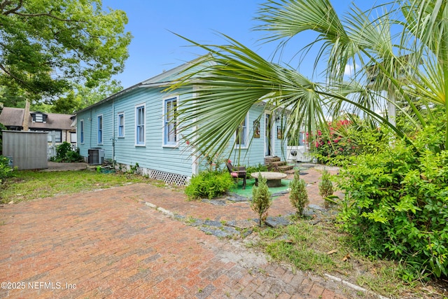 10 Venancio St, Saint Augustine, FL 32084 - view of property exterior featuring a patio area and an outbuilding