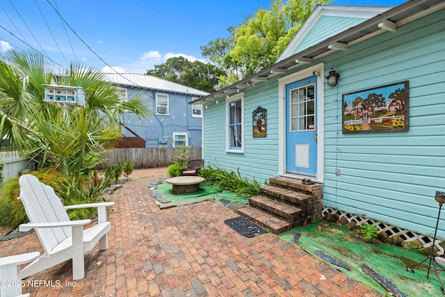 10 Venancio St, Saint Augustine, FL 32084 - fenced backyard featuring entry steps and a patio