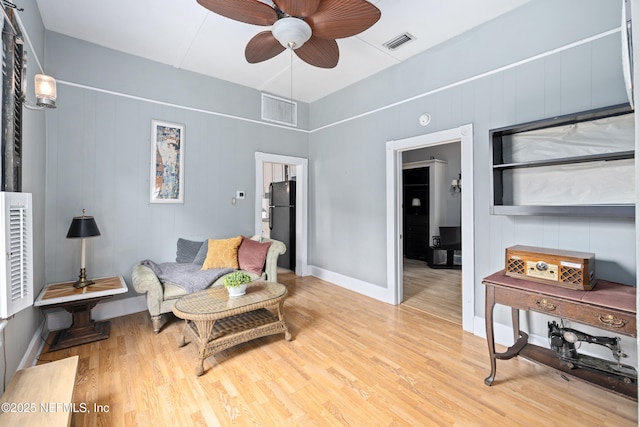 10 Venancio St, Saint Augustine, FL 32084 - living area with ceiling fan and wood finished floors