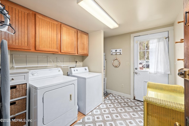 10 Venancio St, Saint Augustine, FL 32084 - washroom with washer and dryer, cabinet space, and light flooring