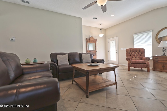 127 Colorado Springs Way, Saint Augustine, FL 32092 - living area with a ceiling fan and light tile patterned floors