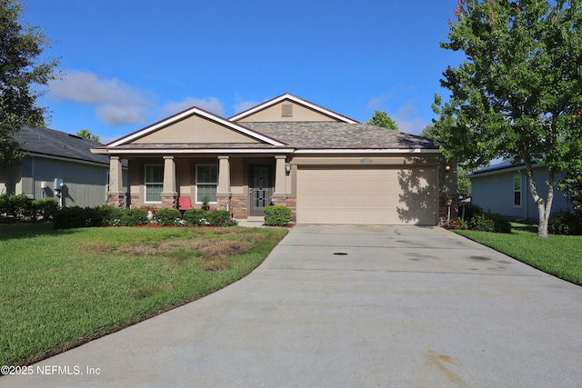 127 Colorado Springs Way, Saint Augustine, FL 32092 - view of front facade with a front lawn, a garage, concrete driveway, and a porch