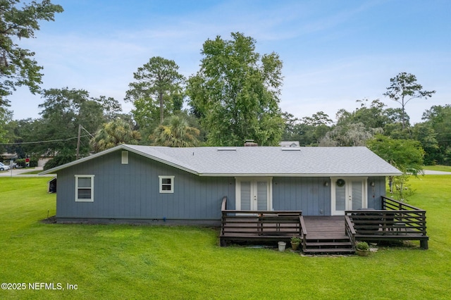 86385 Peeples Rd, Yulee, FL 32097 - back of property with french doors, a wooden deck, a yard, and a chimney