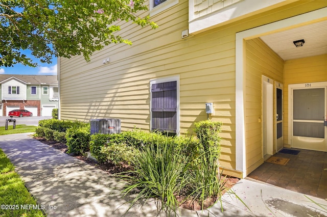 218 Larkin Pl Unit 105, Saint Johns, FL 32259 - view of side of property with a cooling unit