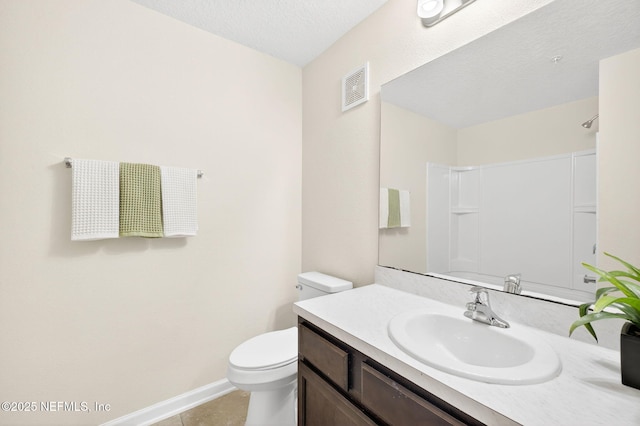 218 Larkin Pl Unit 105, Saint Johns, FL 32259 - bathroom featuring vanity, a shower, tile patterned floors, and a textured ceiling