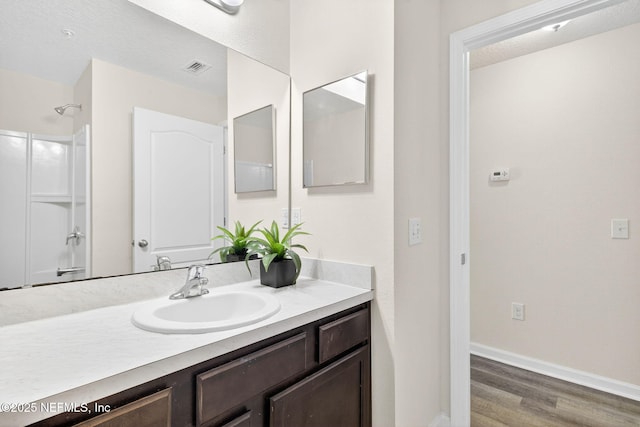 218 Larkin Pl Unit 105, Saint Johns, FL 32259 - full bathroom with vanity and wood finished floors