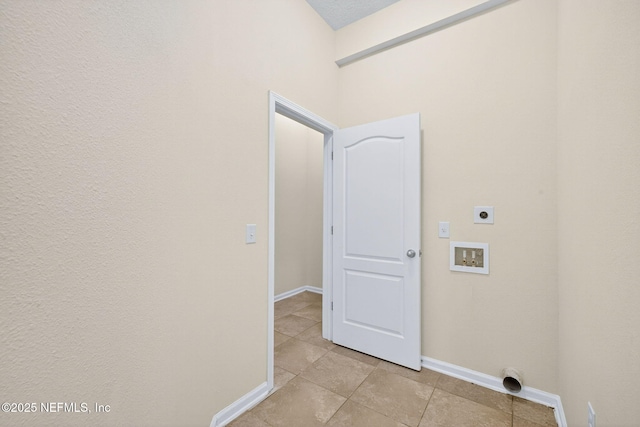 218 Larkin Pl Unit 105, Saint Johns, FL 32259 - washroom with hookup for an electric dryer, hookup for a washing machine, and light tile patterned flooring