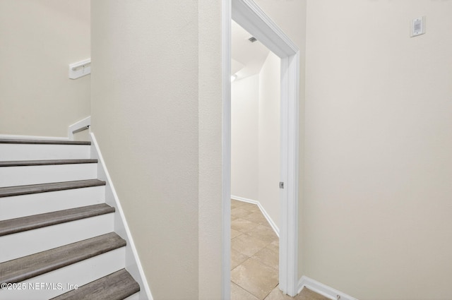 218 Larkin Pl Unit 105, Saint Johns, FL 32259 - stairs featuring baseboards and tile patterned flooring