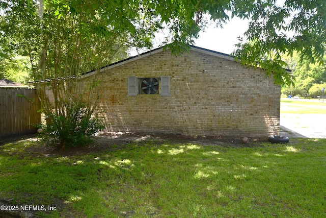 44186 Lee Dr, Callahan, FL 32011 - view of home's exterior with brick siding