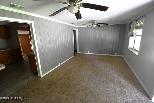 44186 Lee Dr, Callahan, FL 32011 - empty room with ornamental molding, ceiling fan, and carpet flooring