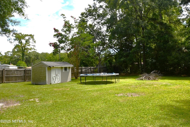 44186 Lee Dr, Callahan, FL 32011 - view of yard featuring a trampoline and a shed