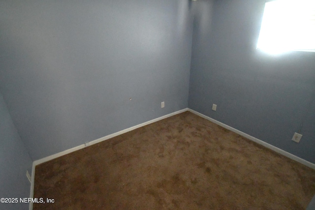 44186 Lee Dr, Callahan, FL 32011 - carpeted empty room featuring baseboards