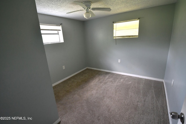 44186 Lee Dr, Callahan, FL 32011 - carpeted spare room with a textured ceiling and ceiling fan
