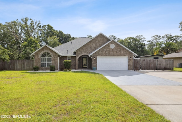 4804 Winton Cir, Saint Augustine, FL 32086 - view of front facade with concrete driveway, a garage, and brick siding